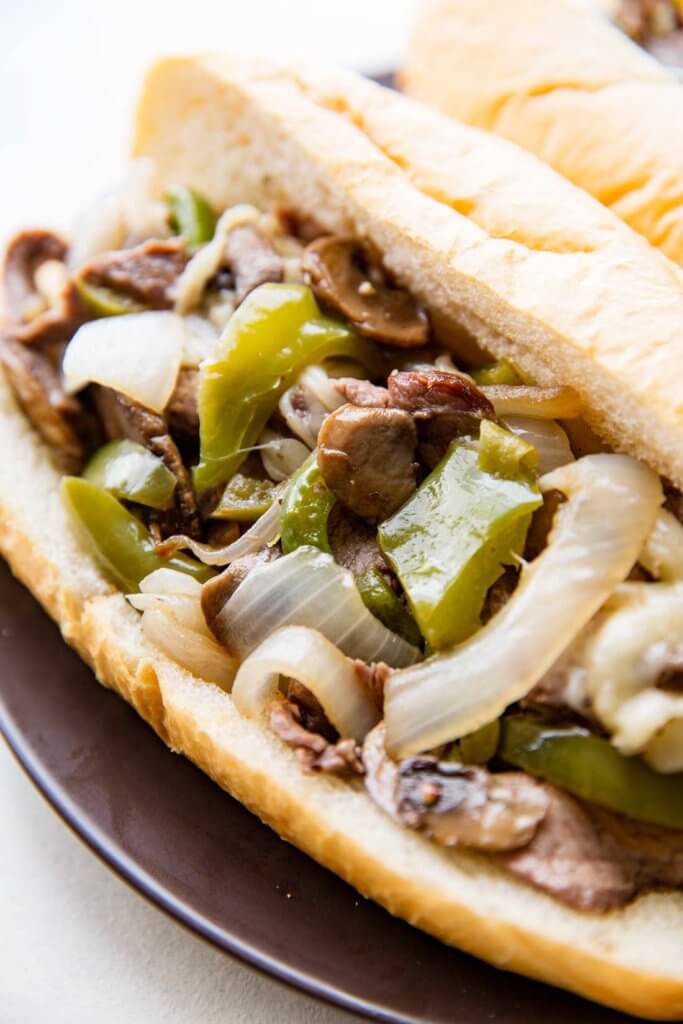 the best and easiest philly cheesesteak cooked on a sheet pan
