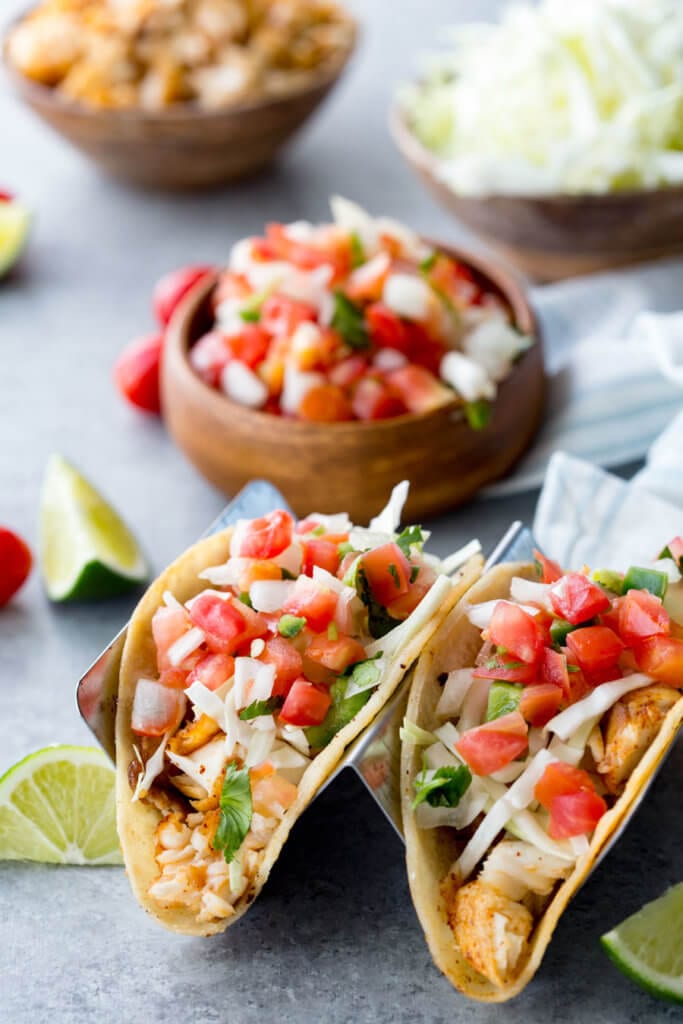 Tilapia Tacos: Easy to make, mildly flavored, delicious, flaky, and loaded with flavor. These tilapia fish tacos are healthy, easy, and delicious.