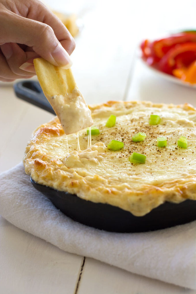 Your favorite pasta dish gets a makeover with this creamy Cajun Chicken Alfredo Dip with cream cheese, mozzarella, chicken and spice. Only five ingredients in this super cheesy dip with a creole kick! 