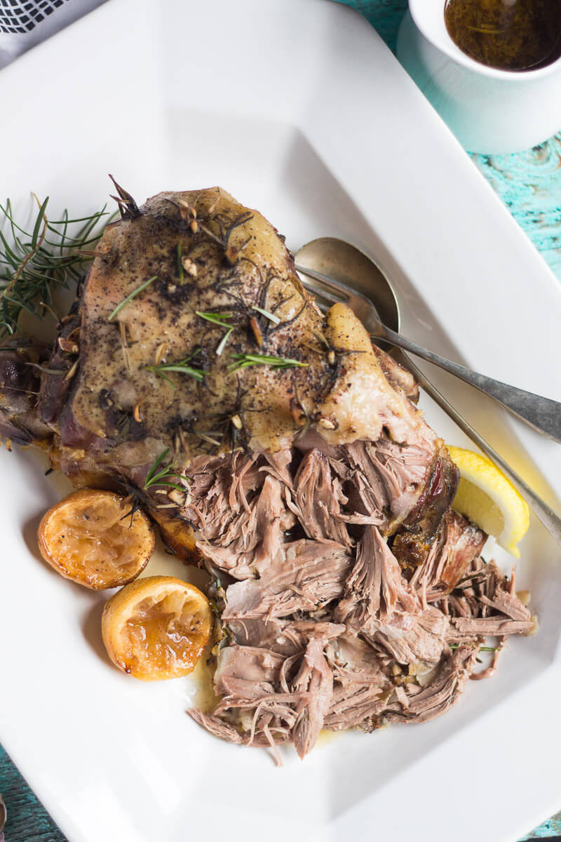 Leg of Lamb Slow Cooker: Delicious Lamb, spiked with lemon, rosemary and garlic, is the perfect answer to an easy mid-week meal.