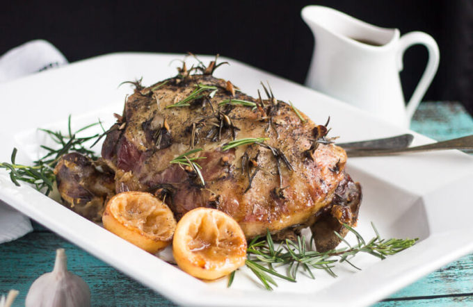 Slow Cooker Leg of Lamb: Delicious Lamb, spiked with lemon, rosemary and garlic, is the perfect answer to an easy mid-week meal.