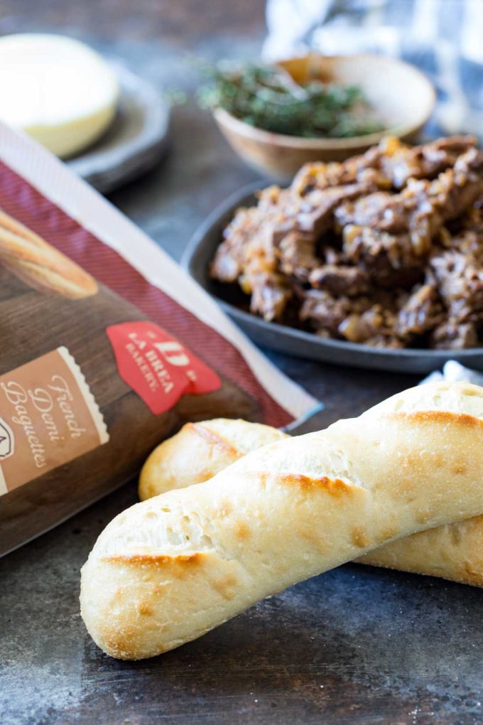 Slow Cooker French Dip: Best French Dip ever!! Delectable, tender, and flavorful beef, wrapped in melted cheese in a French Demi Baguette.