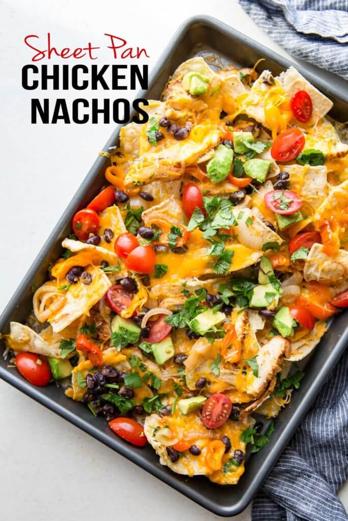 Chicken Nachos are ultra filling, easy to make, and are loaded with crunchy chips, melty cheese, flavorful chicken, and your favorite toppings! 
