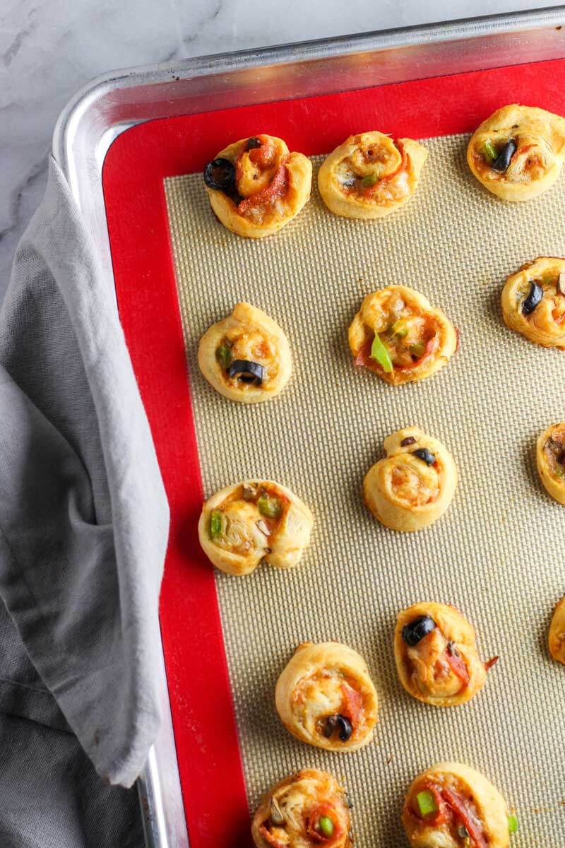 These Supreme Pizza Pinwheels are the perfect appetizer to please the whole crowd!