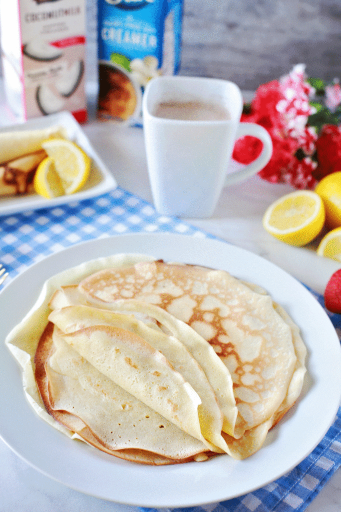 Dairy Free Coconut crepes are easy to make and so good. Add a squeeze of lemon!