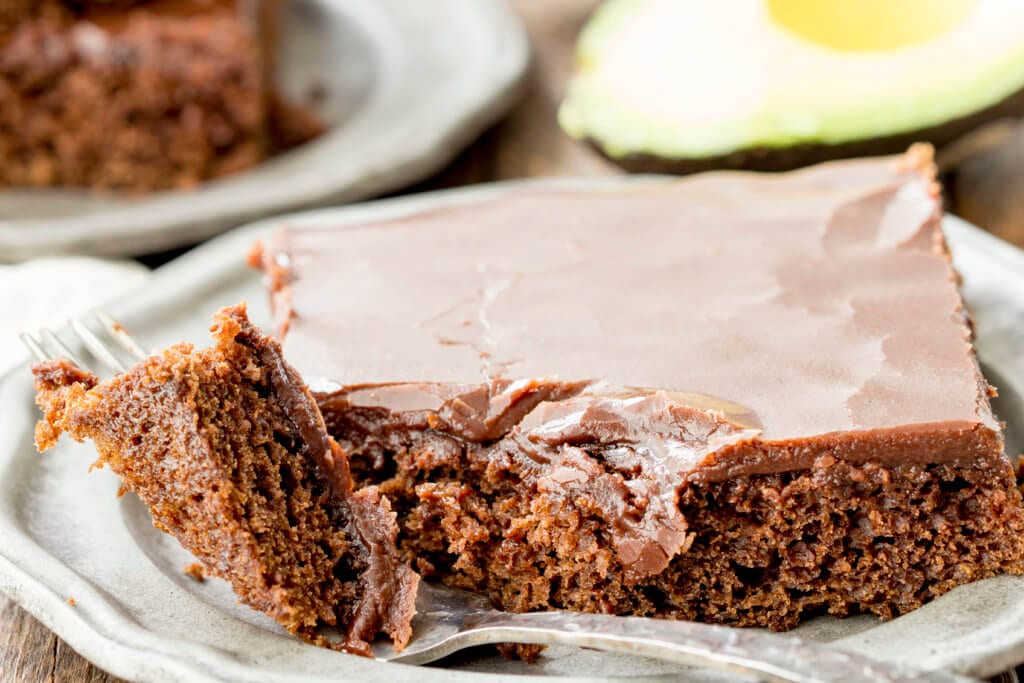 Texas Sheet Cake! This pan of chocolate texas sheet cake offers a moist, rich cake, and a frosting that is to die for delicious, with some fun ingredient swaps that rev things up a bit. You are going to love it.