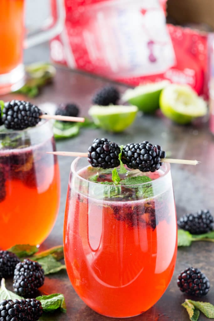 Mocktail with black cherry dragonfruit lime black berry and mint