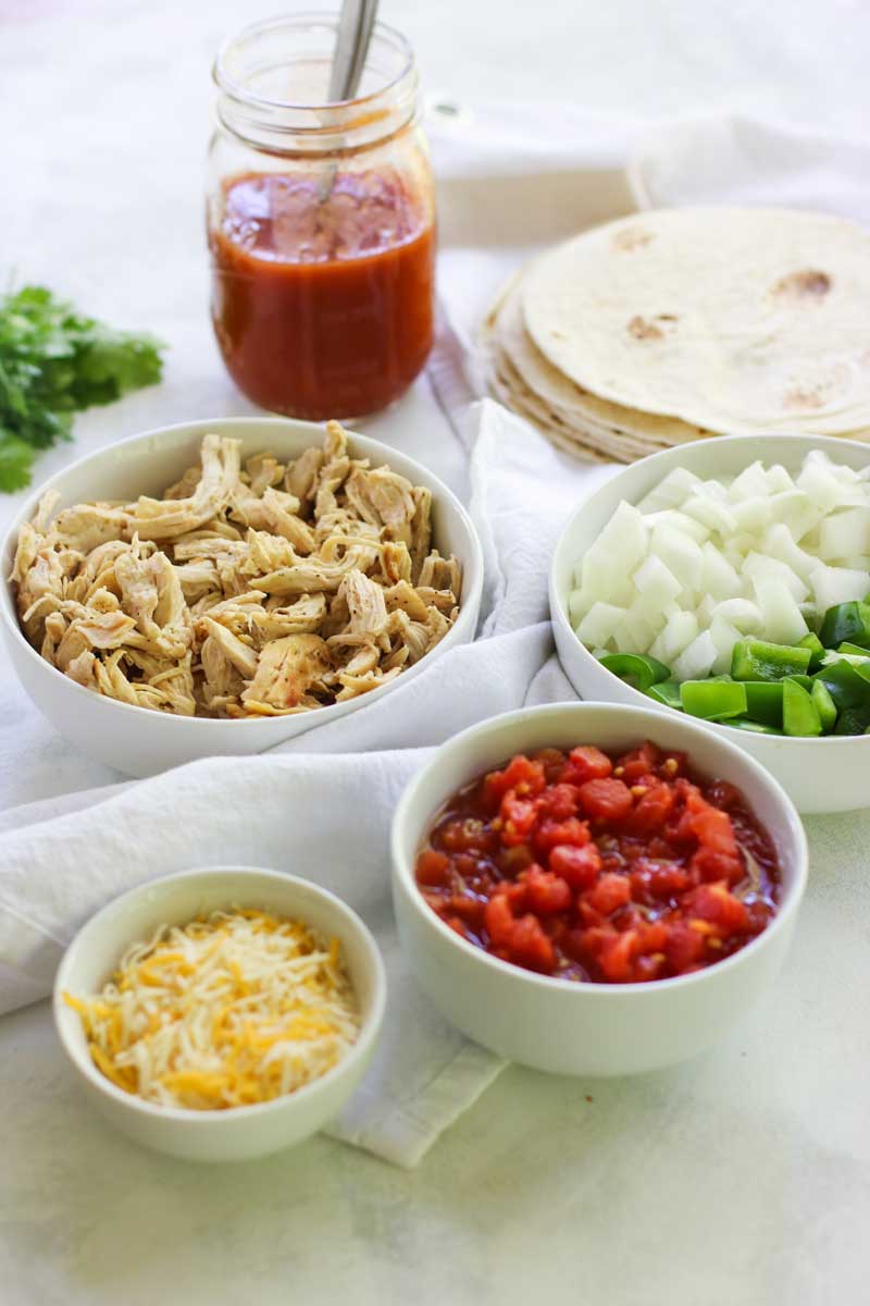 These Chicken Enchilada Meal Prep Bowls are perfect to spice your up meal prep for lunch or dinner!