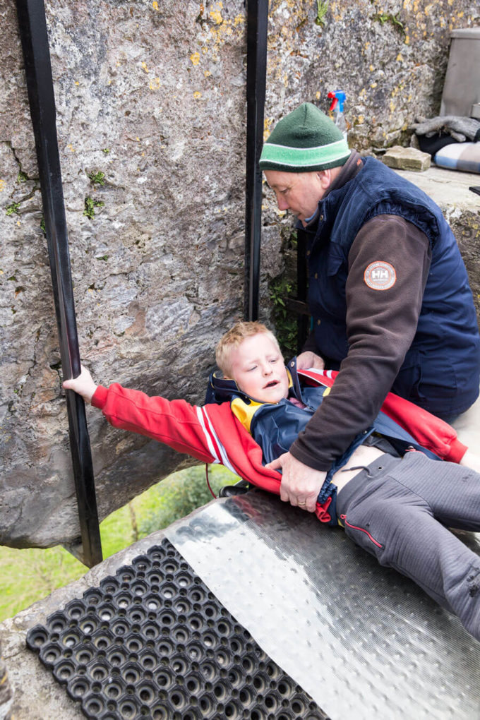 Derrick to scared to kiss the Blarney Stone in Ireland Cork County