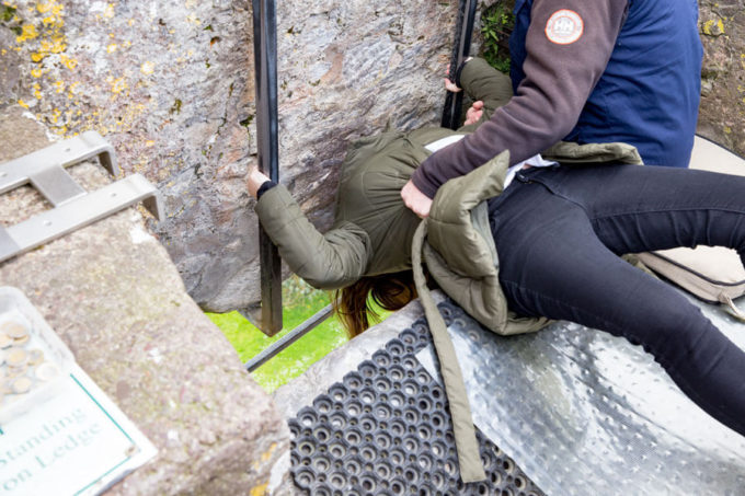 Kissing the Blarney Stone at Blarney Castle county cork Ireland