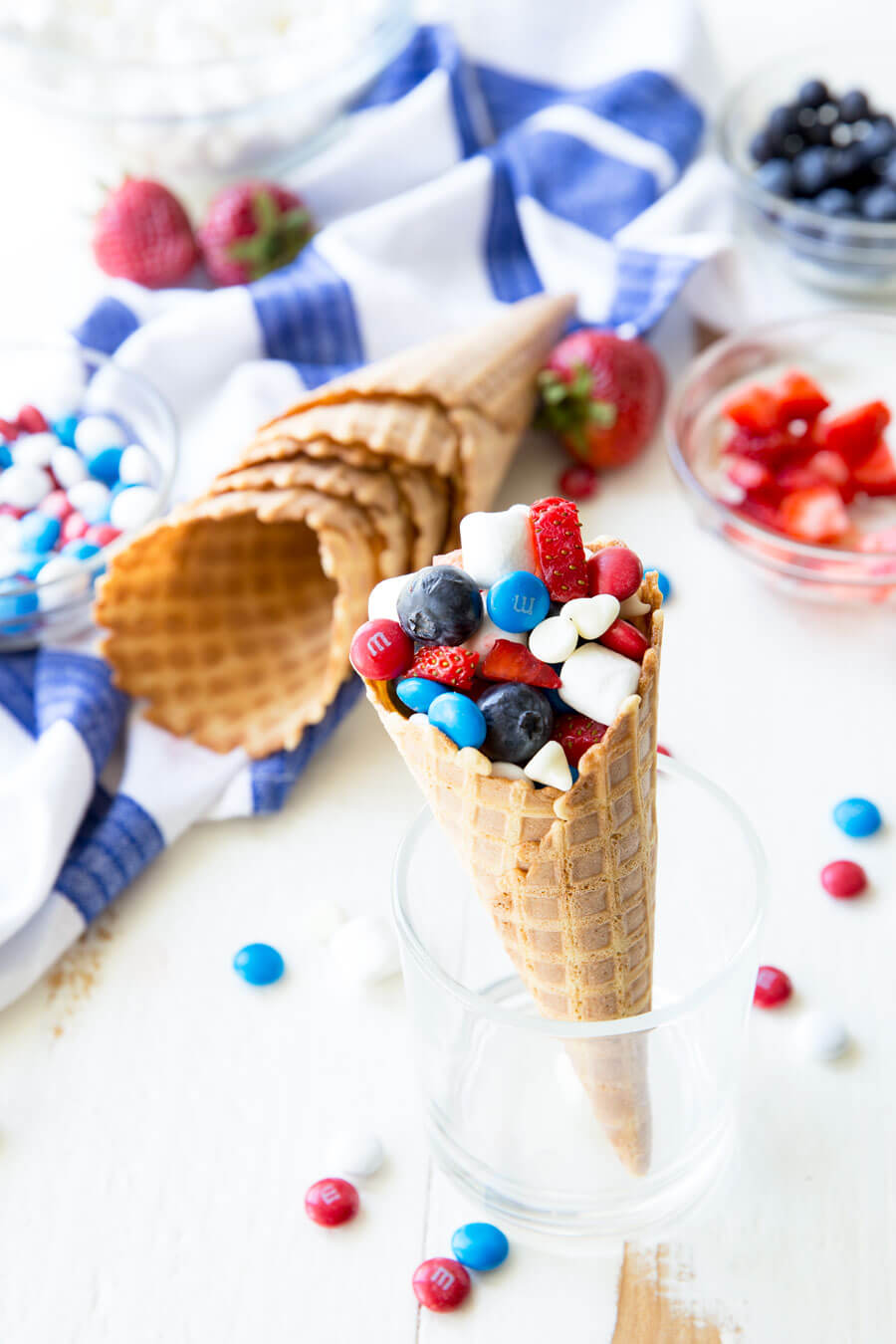 Campfire cones, waffle cones filled with marshmallows, fruit, and chocolate, and cooked in a campfire or oven. 