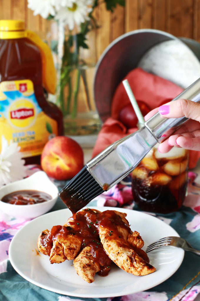 Easy peach BBQ sauce over grilled chicken