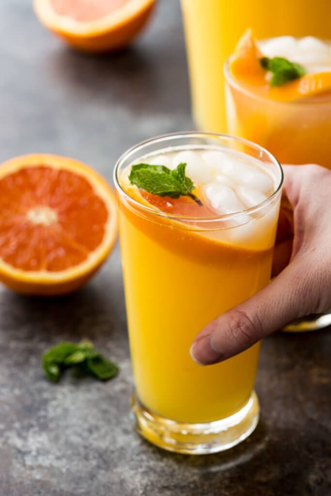 Fresh and refreshing mango orange mojito virgin drink