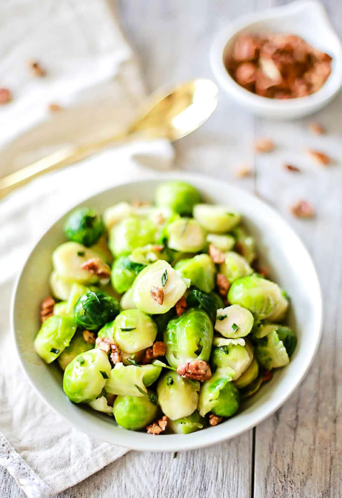 Roasted Brussel Sprouts can't beat these butter glazed brussel sprouts with candied pecans