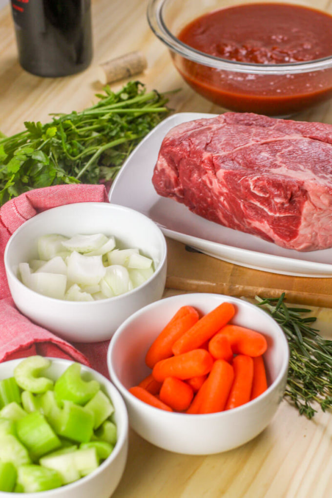 This Braised Tomato Chuck Roast is a decadent, but easy dinner - perfect for Sunday dinners!