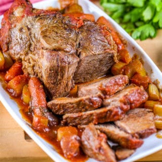 This Braised Tomato Chuck Roast is a decadent, but easy dinner - perfect for Sunday dinners!