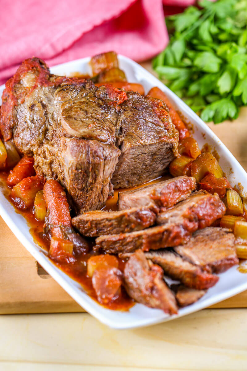 This Braised Tomato Chuck Roast is a decadent, but easy dinner - perfect for Sunday dinners!