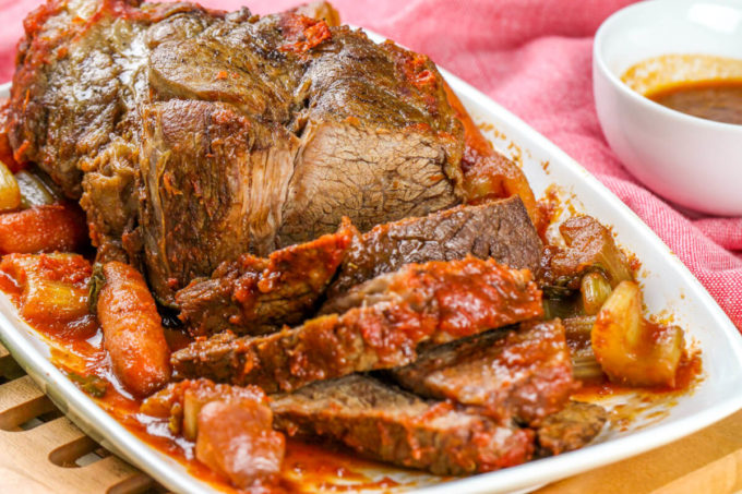 This Braised Tomato Chuck Roast is a decadent, but easy dinner - perfect for Sunday dinners!