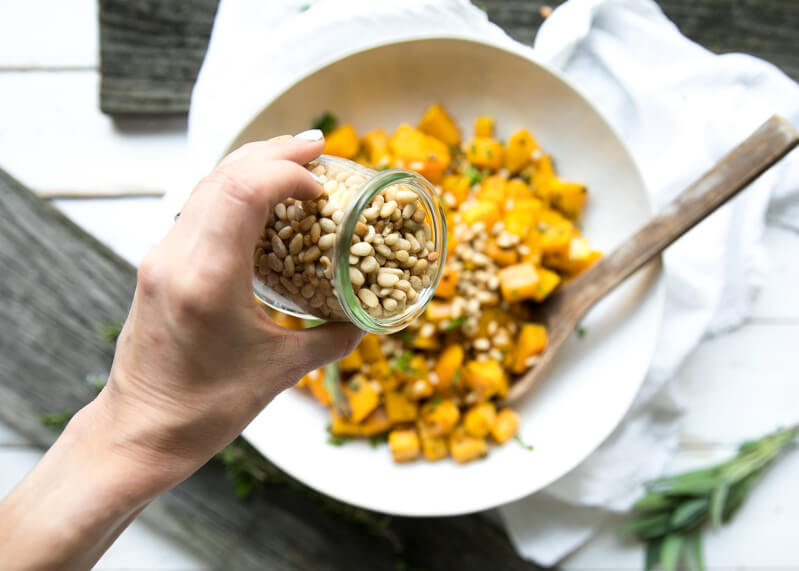 5 Ingredient Oven Roasted Garlic and Herb Butternut Squash with Pine Nuts