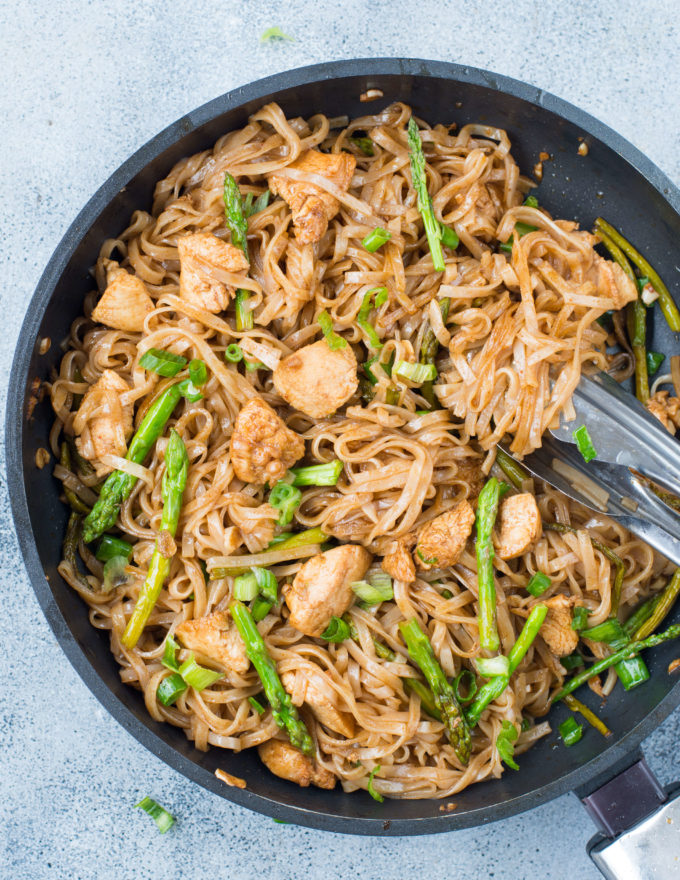 Chicken Asparagus Stir Fry Noodles is a quick stir fry recipe with bursting Asian flavors. All you will need is one pan and less than 30 minutes to make a delicious weeknight dinner. While Chicken and asparagus works as a wonderful combination, you add any vegetable of your choice.