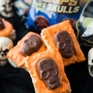 Tasty and festive Halloween Rice Krispie Treats with Butterfinger Peanut Butter Skulls