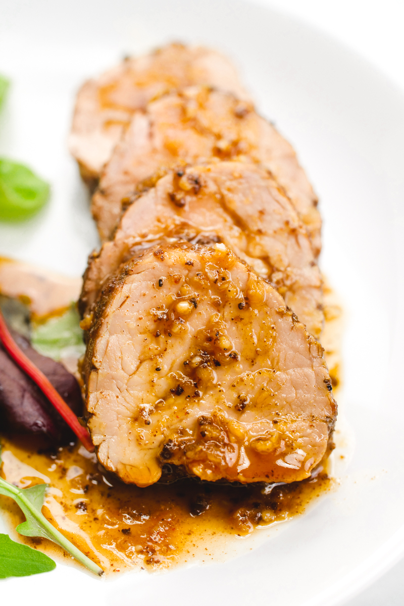 Island style pork tenderloin, rubbed with spices, and cooked in a delicious sauce for a tropical vacation for your tastebuds. 