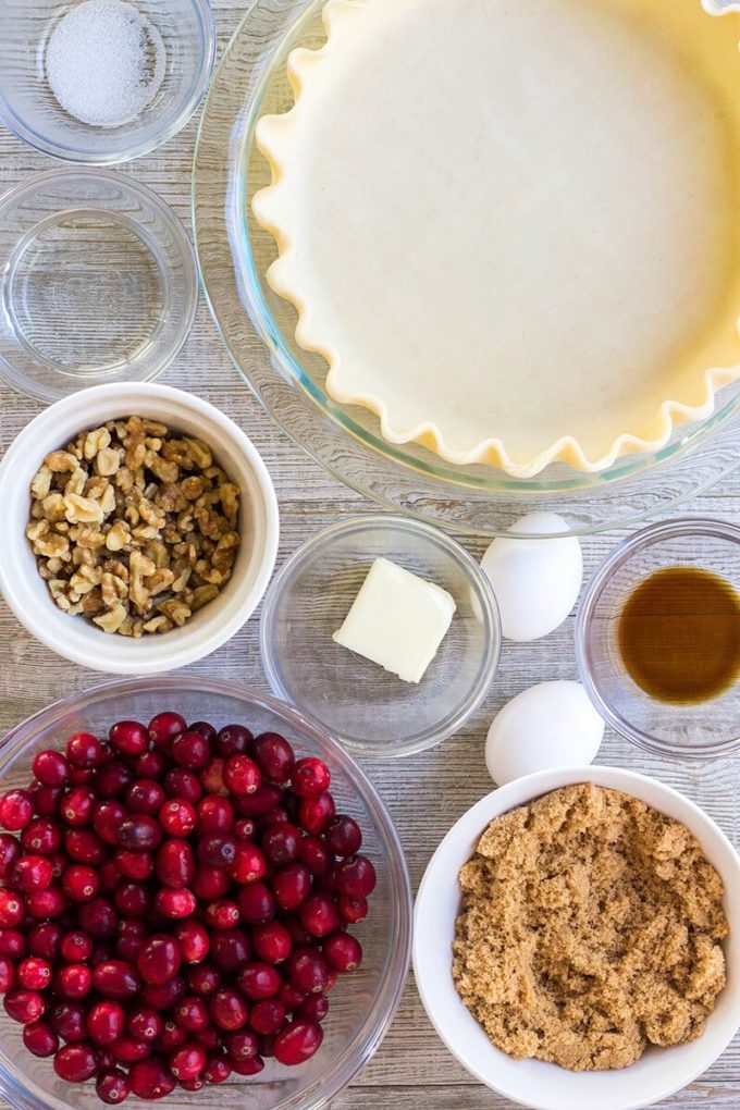 Cranberry Walnut Pie is a sweet, tart, and nutty pie that's a showstopping dessert for the holidays! Savor this pie as is, or top it with a scoop of vanilla ice cream for a treat you won't forget!