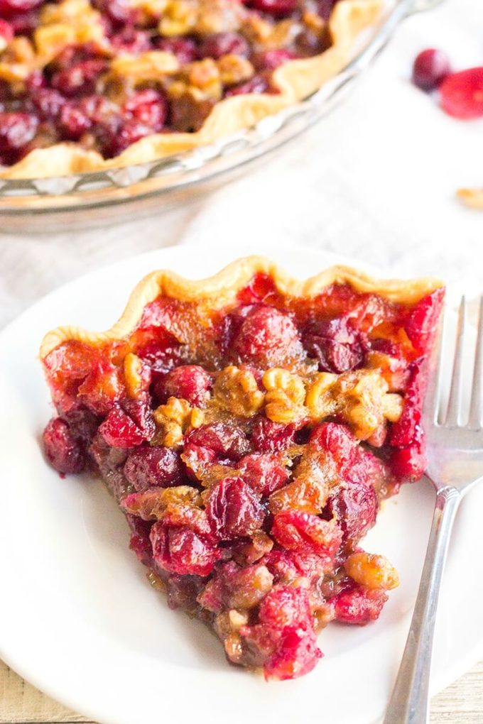 Cranberry Walnut Pie is a sweet, tart, and nutty pie that's a showstopping dessert for the holidays! Savor this pie as is, or top it with a scoop of vanilla ice cream for a treat you won't forget!