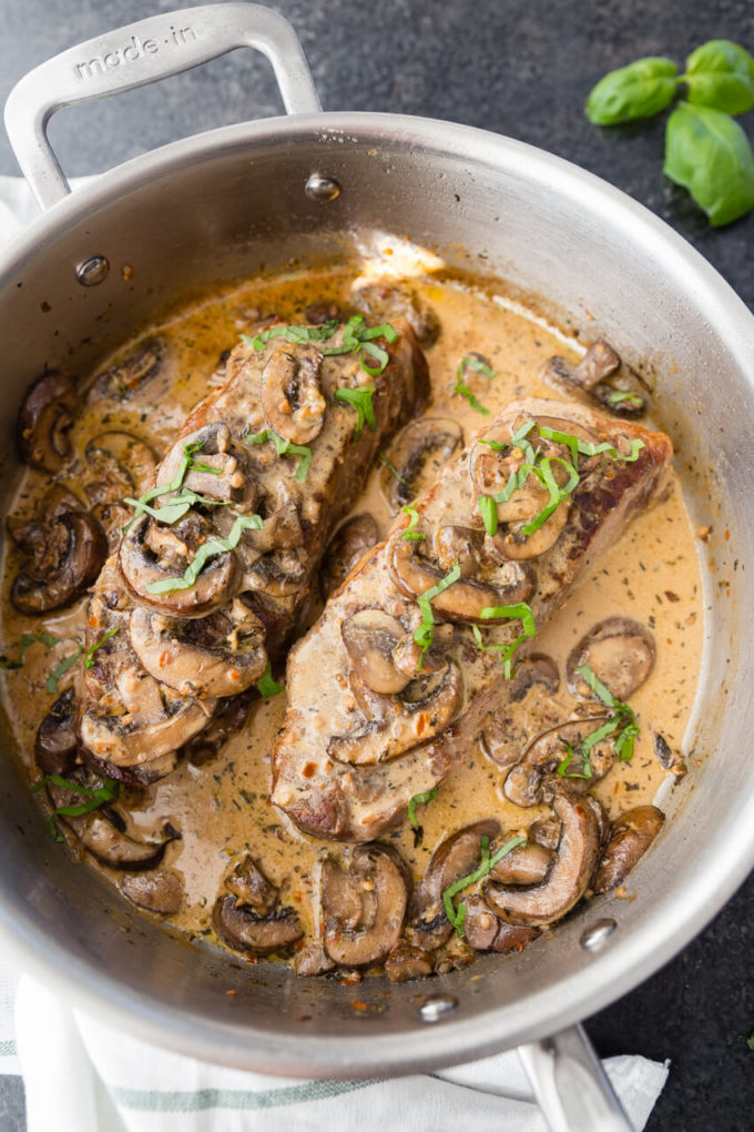 Garlic Parmesan Mushroom Cream Sauce on top of a delicious pan seared steak