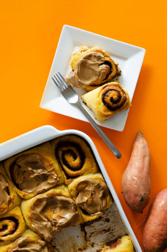 These Sweet Potato Cinnamon Rolls are decadent, fluffy, and slathered with a simple brown sugar frosting. Cozy up with a cup of tea and these cinnamon rolls for the perfect autumn morning!
