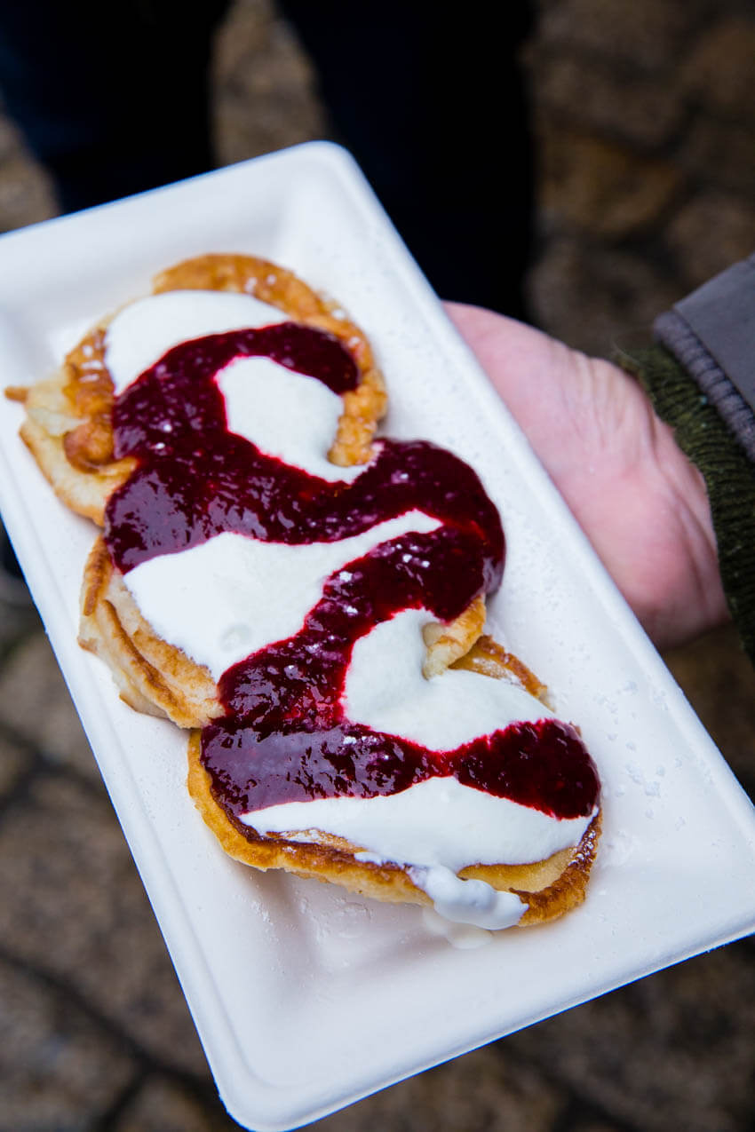 Sweet potato pancakes, these are potato pancakes covered in creme fraiche and jam