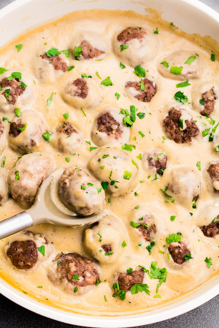 Swedish Meatballs: Mouthwatering, homemade, Swedish meatballs smothered in a decadent sauce; these beat IKEA every time!