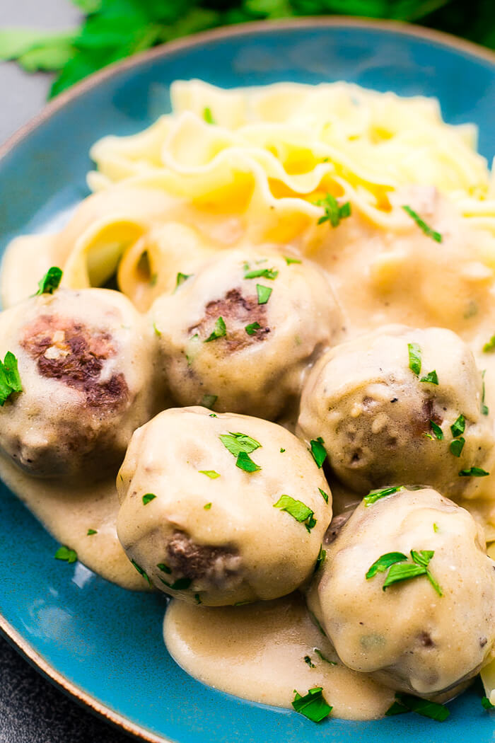 Easy to make Swedish meatballs served on a bed of egg noodles. These meatballs are made from scratch and smothered in a creamy gravy