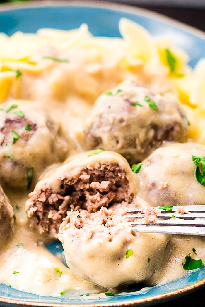 Swedish Meatballs: Mouthwatering, homemade, Swedish meatballs smothered in a decadent sauce; these beat IKEA every time!