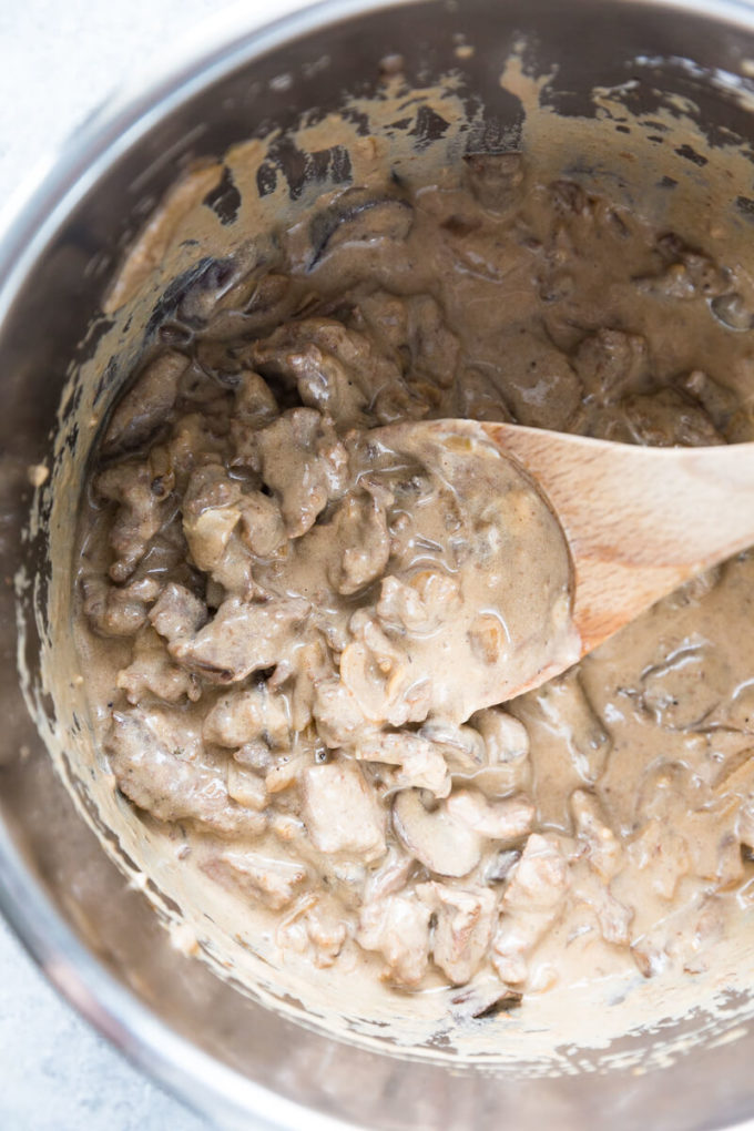 Creamy Beef Stroganoff: tender flavorful beef, hearty and creamy sauce, and plenty of mushrooms make this easy beef stroganoff an instant pot pressure cooker classic.