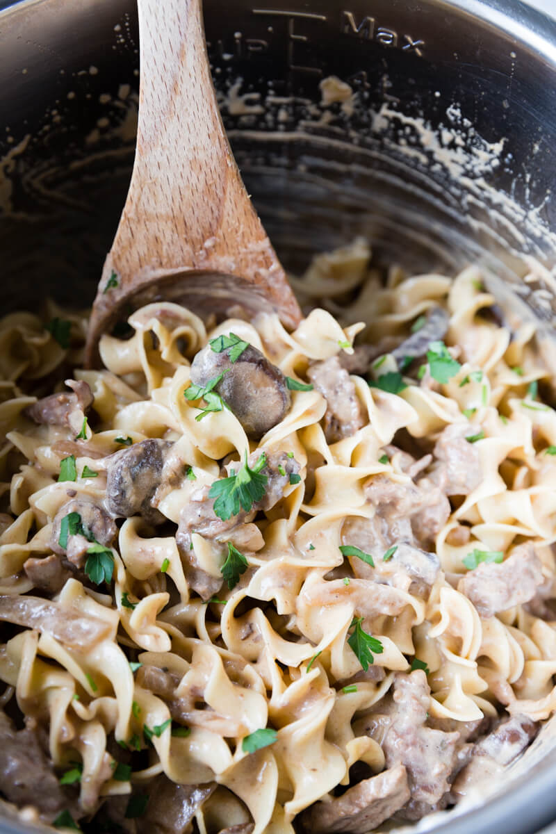 Beef Stroganoff: tender flavorful beef, hearty and creamy sauce, and plenty of mushrooms make this easy beef stroganoff an instant pot pressure cooker classic.