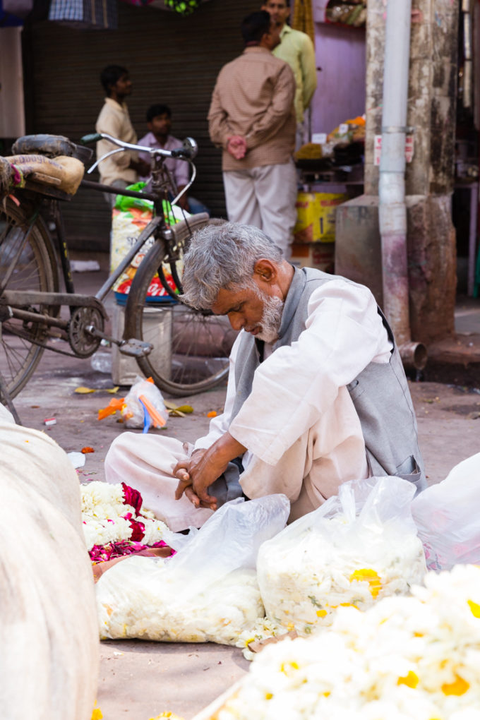 Flower vendor, praying