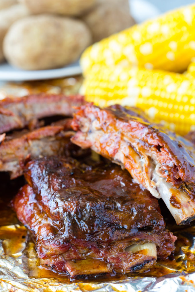 Delicious BBQ baby back ribs cooked in the oven or pellet smoker