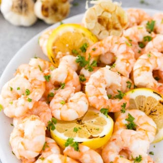 Garlic butter shrimp with fresh parsley and lemon