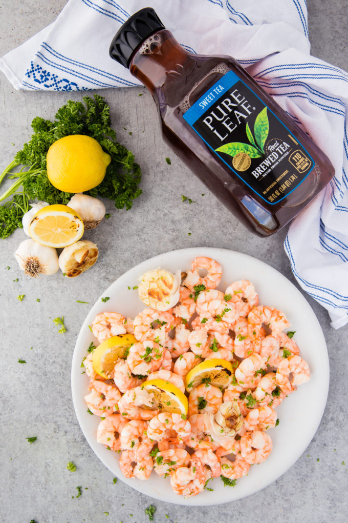 A large platter of garlic butter shrimp