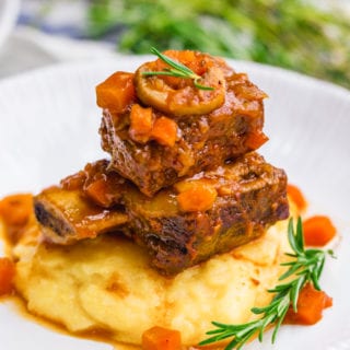 Braised short ribs, a great dinner option, served over polenta