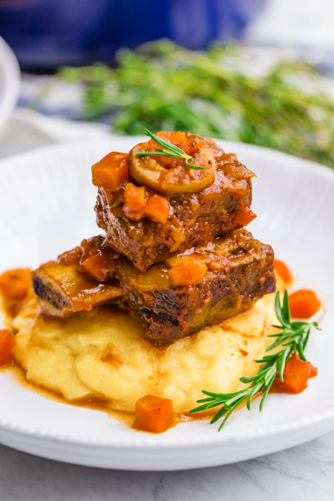 Braised short ribs, a great dinner option, served over polenta