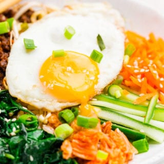 White bowl filled with bibimbap