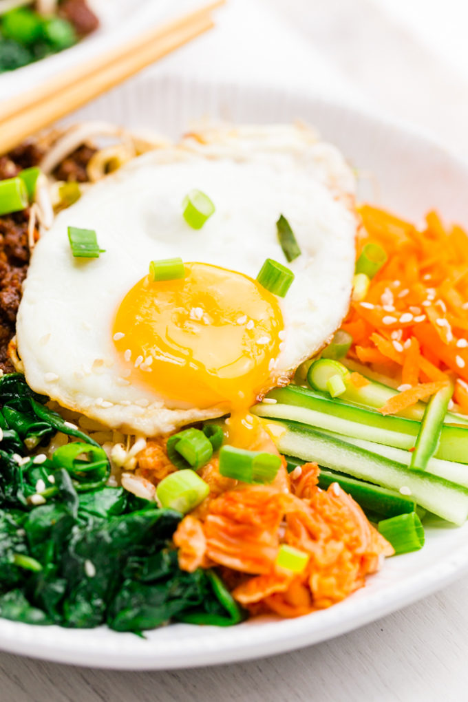 White bowl filled with bibimbap