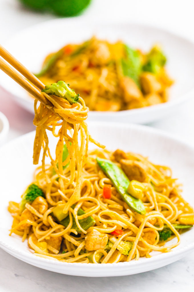 Garlic Chicken Lo Meain in a white dish with chopsticks