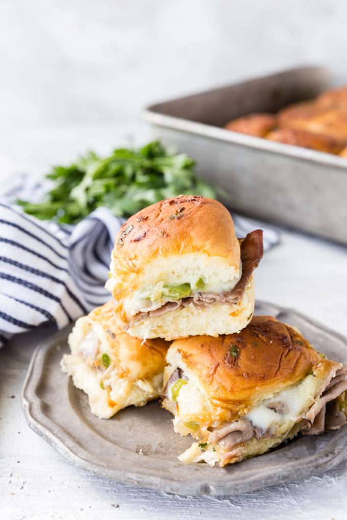 A plate of Philly cheese steak sliders