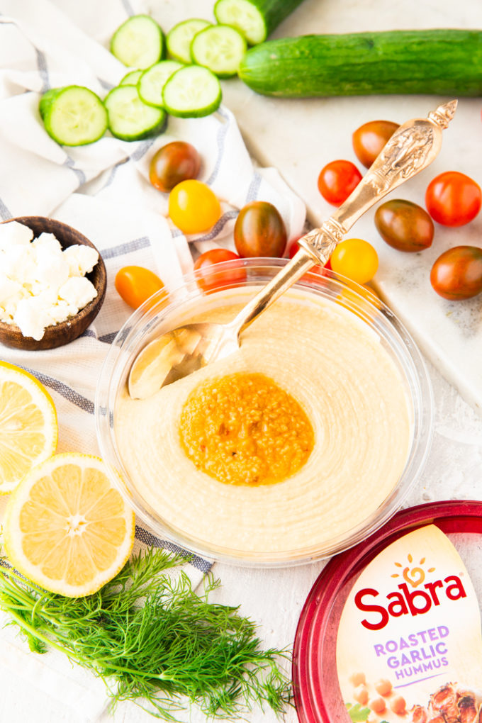 Greek chicken power bowl ingredients with hummus