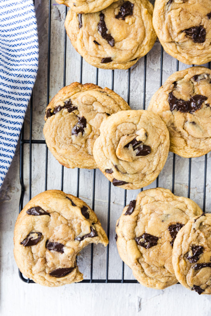 A top down view of Traeger smoked chocolate chip cookies, with a few bites taken out