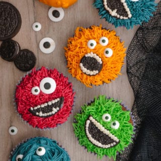 Monster Halloween Cupcakes- Grass icing tip, colored frosting, eye balls, and OREO cookies