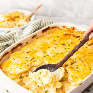 Easy scalloped or au gratin potatoes, these potatoes are loaded with cheese and creamy sauce and baked to perfection